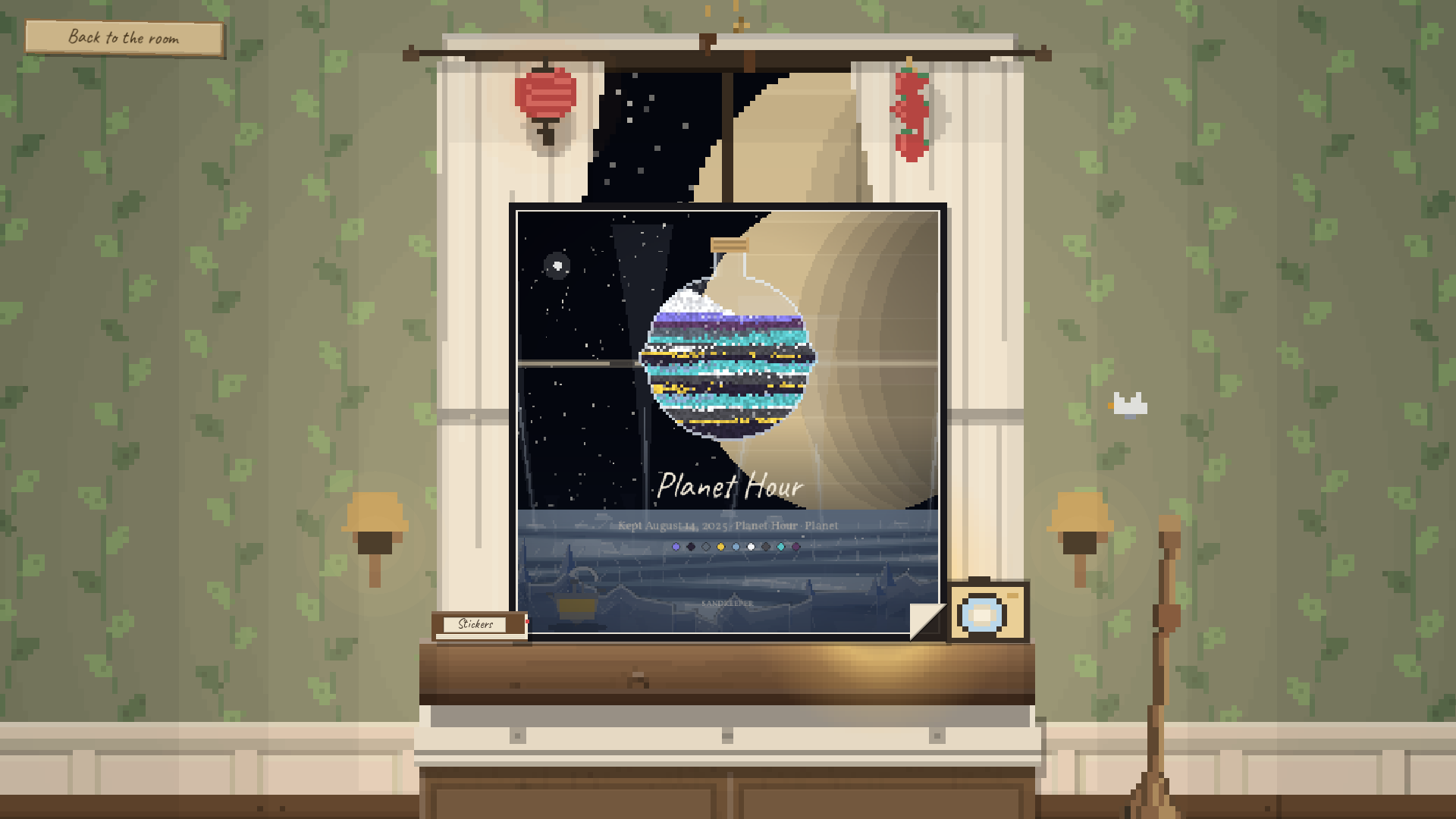 A photograph of a round banded bottle with Saturn behind it, in a black frame at the bench.